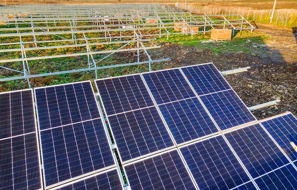Solar panels shading vegetable crops in Mauritius to cut irrigation water use